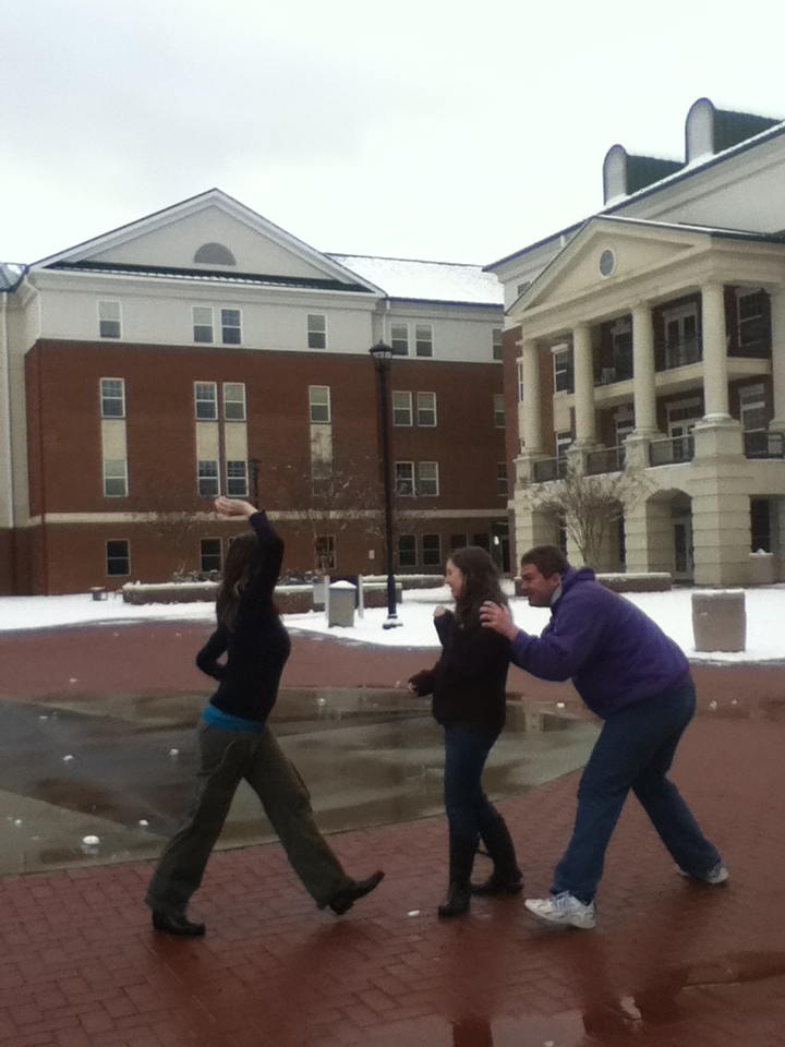 Snow Day 2013 5 Students having a snowball fight in front of Balsam residence hall. Photo by Brandy Carl.