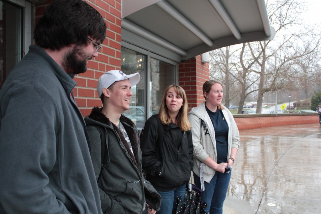 Students in the America's Wilderness Ethics and Aesthetics class wait on the van to arrive.  Photo by Brandy Carl