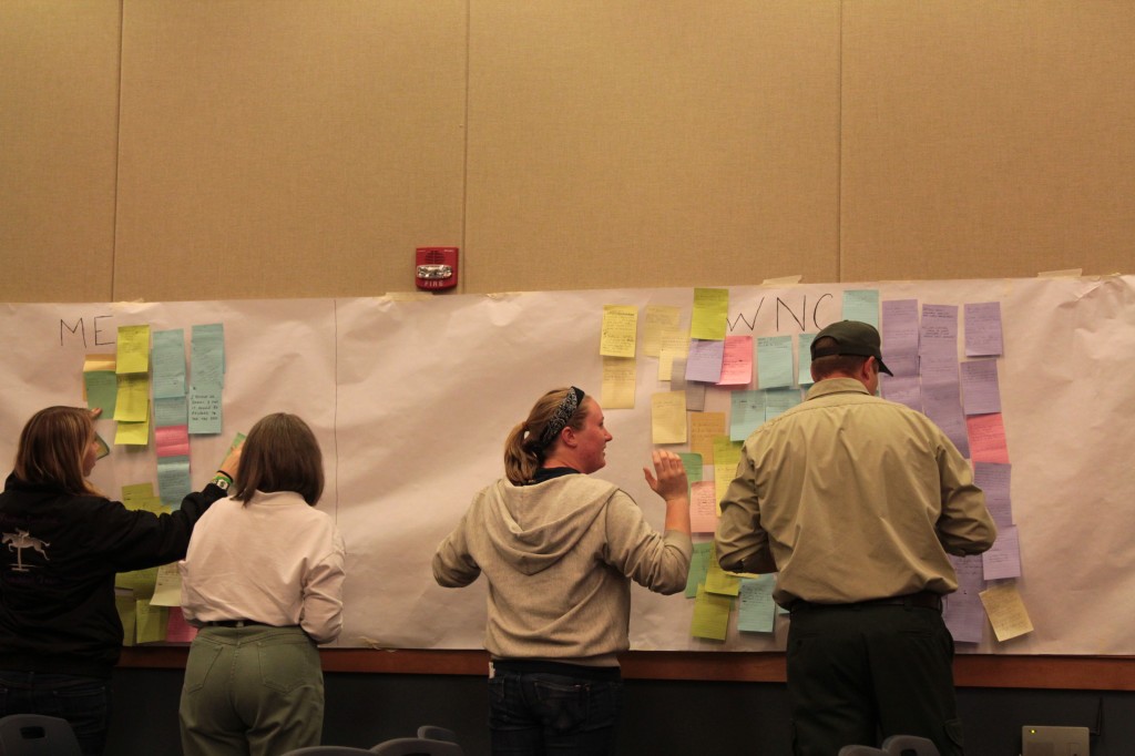 After the meeting adjourned, students helped with the clean up process.  Photo by Brandy Carl.